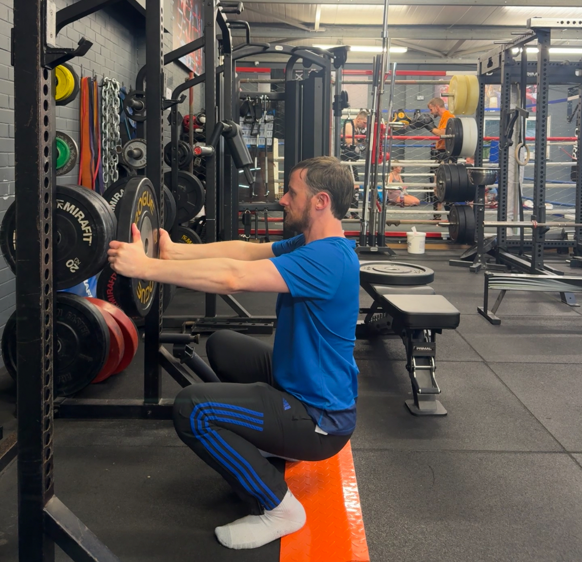 Coaching squat technique at Hanuman Muay Thai